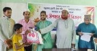বড়লেখায় প্রবাসী ঐক্য পরিষদের ঈদ উপহার সামগ্রী বিতরণ